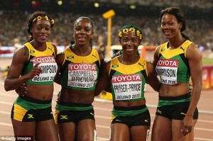 Fraser-Pryce, second right, with other mates