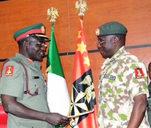 Maj.-Gen Ilya Abbah, left, taking over from Maj General TY Buratai