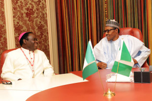 Both men settle down for a tete-a-tete. All Photos by Sunday Aghaeze