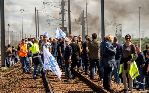 Migrants on the rail tracks linking Paris and London. Photo: Telegraph UK