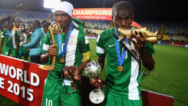 Adidas Golden Ball winner Kelechi Nwakali (L) and adidas Golden Boot and Silver Ball winner Victor Osimhen pose with their trophies