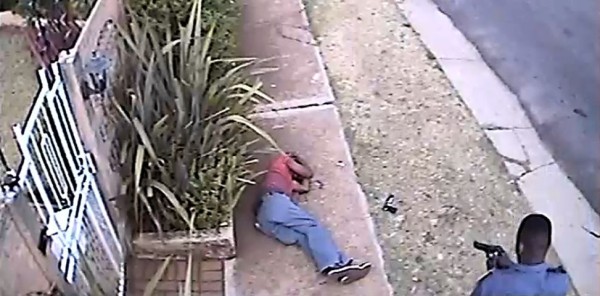 South African cop shoots a suspect dead. Sunday Times photo