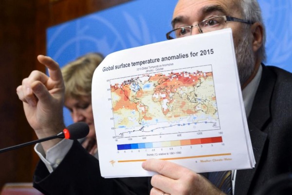 File: Secretary-General of the World Meteorological Organization Michel Jarraud shows a document on global surface temperature anomalies for 2015 on November 25, 2015 in Geneva (AFP Photo