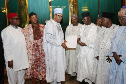 Chief Chekas Okorie, Chief Agbo Major (NNPP), President Muhammadu Buhari, The National Chairman of the Peoples Democratic Movement (PDM), Alhaji Bashir Yusuf Ibrahim, Deputy Chairman/ACD, Dr. Breakforth Onwunuya, Chairman CPP Dr Sam Eke, Alhaji Ismaila Sifawa and others during a courtesy visit by the members of newly elected Inter-Party Advisory Council (IPAC) at the State House in Abuja. PHOTO; SUNDAY AGHAEZE. DEC 8 2015.