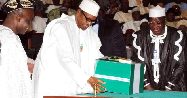 President Buhari submitting budget last December.