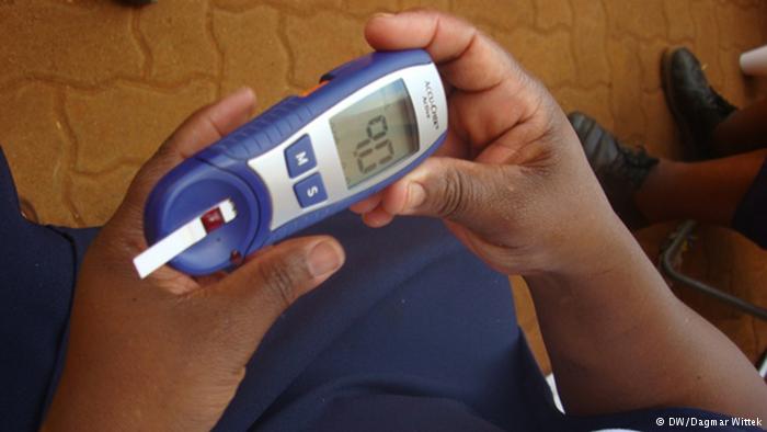 checking blood sugar for a diabetic