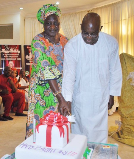 Mark and wife Helen cut his birthday cake