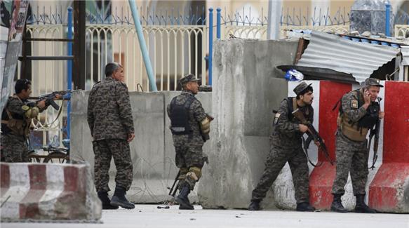 Policemen in Kabul after the blast. Al Jazeera Photo
