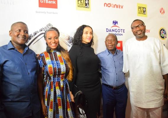 Dangote, DJ Cuppy(Otedola's daughter), Iara Oshiomhole, Adams Oshiomhole and Femi Otedola at DJ Cuppy's event in Lagos last year