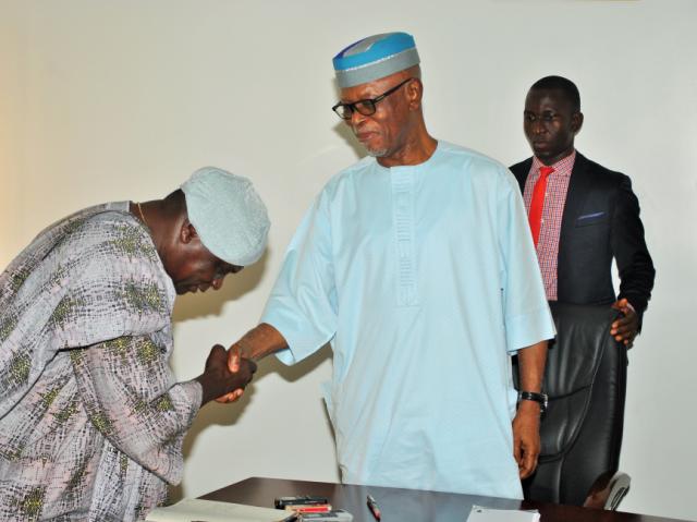 The National Chairman of the All Progressives Congress (APC), Chief John Odigie-Oyegun (right) congratulating the Chairman of the party’s fact-finding/reconciliation committee for Edo state, Prince Olagunsoye Oyinlola during the committee’s inauguration at the APC National Secretariat in Abuja on Monday.