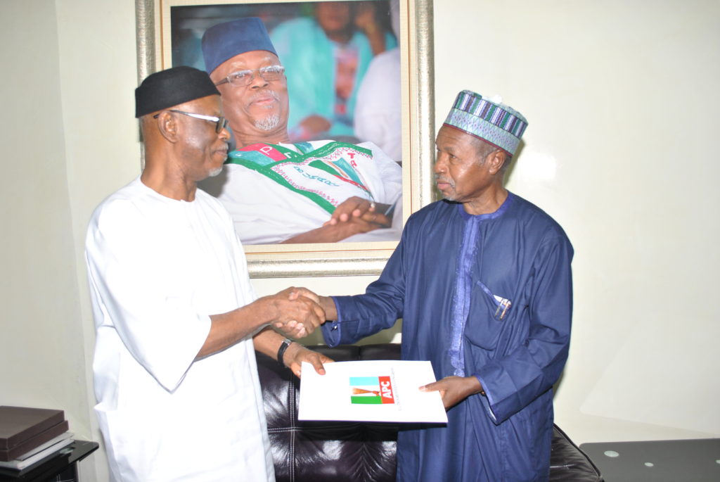 (R-L) The National Chairman of the All Progressives Congress (APC), Chief John Odigie-Oyegun while receiving the report of the Party’s Committee for Edo State Governorship Primary Election headed by the Katsina State Governor, Aminu Bello Masari at the Party National Secretariat in Abuja.