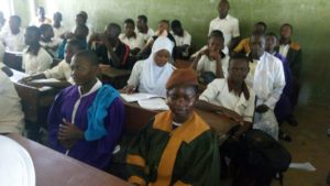 Osun students in church robes in a classroom