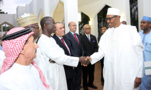 President Buhari in a handshake with cross sections of diplomatic corps as President hosts the Diplomats to breaking of Ramadan Fast at the State House