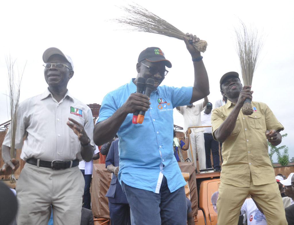 Oshiomhole (left) Obaseki (centre) at a campaign ground
