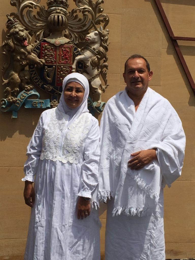 Collis and his wife, Huda in front of British Embassy