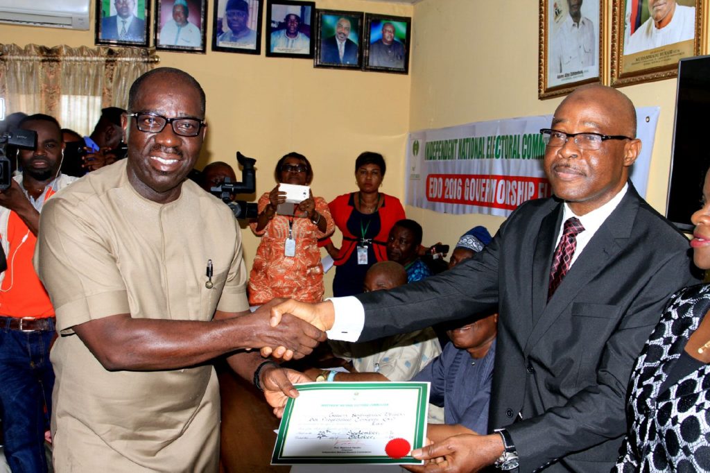 Obaseki-receiving-his-certificate-as-winner-of-the-election
