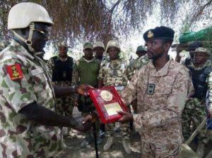 Late Lieutenant Colonel Muhammad Abu Ali, (left) being decorated by the Chief of Army Staff, Lieutenant General TY Buratai at Gamboru Ngala on 9th September 2015 during an operational visit of the Army chief to the war zone