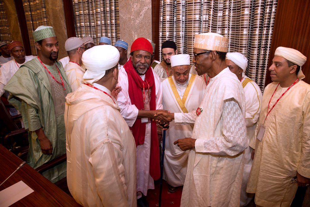 President Buhari during the meeting with Tijjaniyya Islamic Movement led by Sheikh Sharif Mohammed Kabir Ibn Mohammad at State House, Abuja