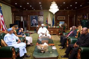 Buhari, Sirleaf, Koroma and Mahama holding at an earlier meeting with Jammeh in Gambia