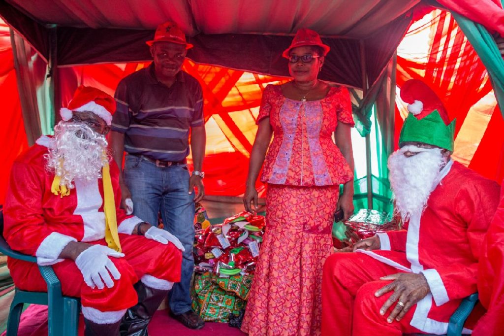 Governor Godwin Obaseki (Left) and Rt. Hon. Comrade Philip Shaibu, Deputy Governor (Right) as Father Christmas at the IDP Children Christmas party