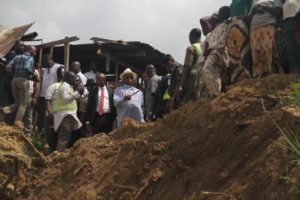 Rear Admiral John Jonah, Bayelsa Deputy Governor inspecting the landslide at Koloma community