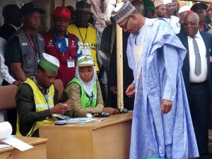 President Buhari undergoing accreditation before voting in Daura during the 2019 general elections. Nigeria will go to polls to elect his replacement in 2023