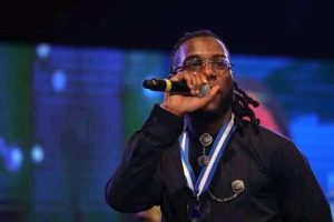 Burna Boy performing at the event