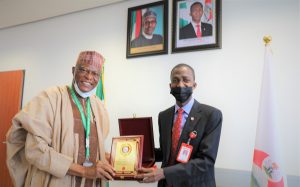 Executive Chairman of the Economic and Financial Crimes Commission, Abdulrasheed Bawa and the leader of the delegation from the University of Abuja led by the Vice Chancellor, Professor Abdulrasheed Na ‘Allah
