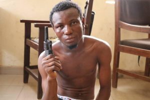 Shehu Taminu Muhammed when he was caught with the gun