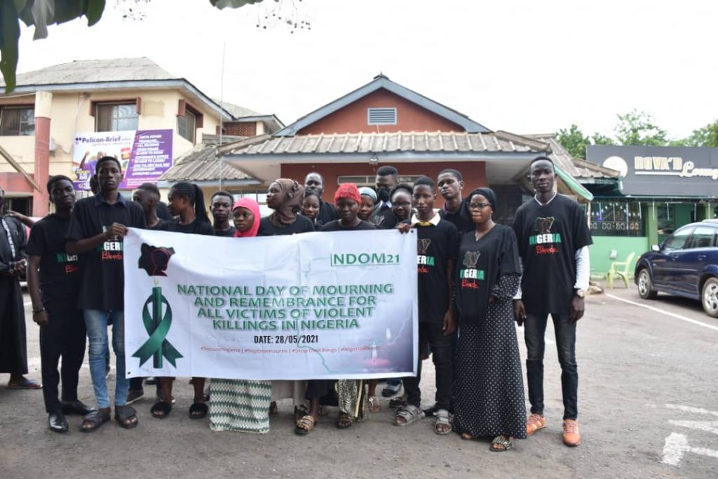 Members of Joint Action Civil Society Coalition in Ogun State during a rally to mark this year National Day of Mourning in remembrance of people that have lost their lives to one crisis or the other across the country on Friday