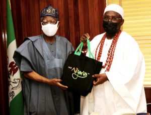 L-R: The Minister of Information and Culture, Alhaji Lai Mohammed, presenting a souvenir to the Oluyin of Iyin-Ekiti, Oba Adeola Adeniyi Ajakaiye, during a courtesy visit to the Minister by the Royal Father in Abuja on Thursday.