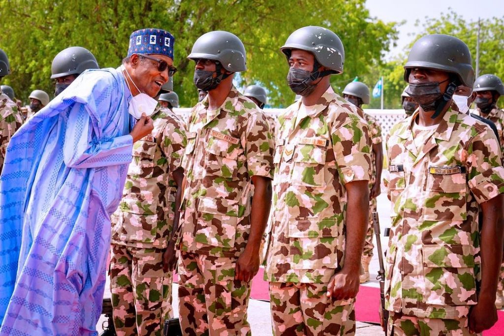 President Muhammadu Buhari with the troops in Maiduguri, Borno State