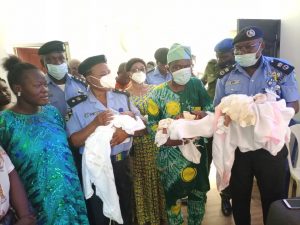 The Commissioner of Police and the triplets during the visit