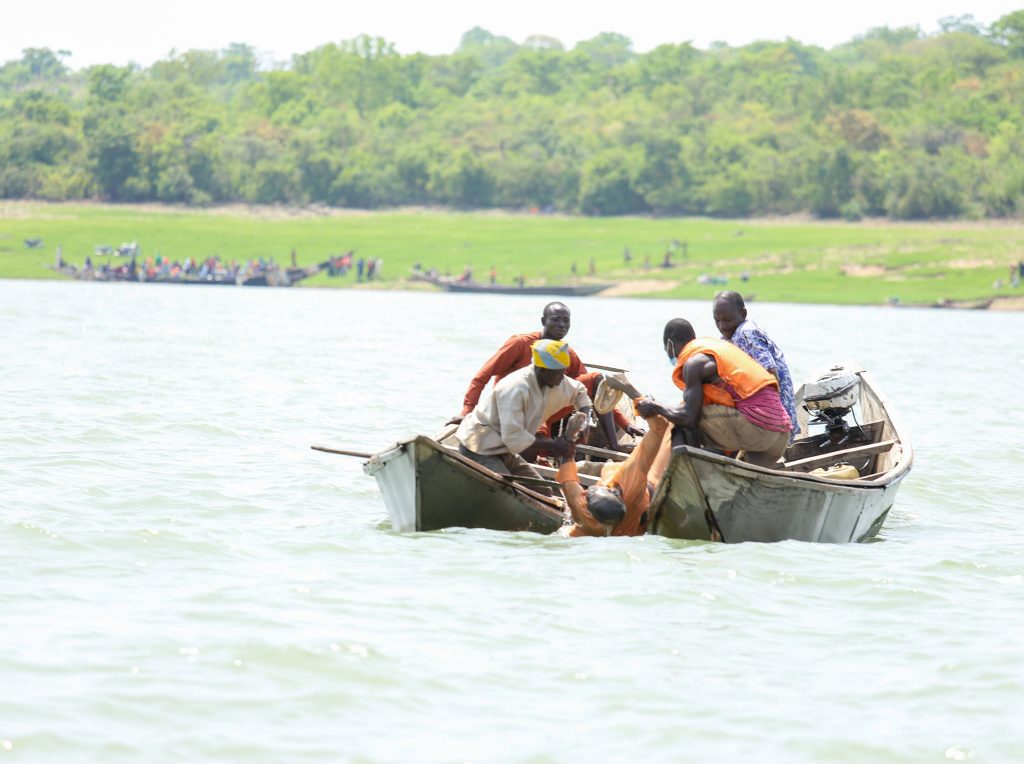 Remains of one the victims being recovered during search and rescue efforts at a scene of a boat mishap at Warrah, Ngaski Local Government Area of Kebbi state.