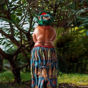 Clarion Chukwurah goes topless for birthday
