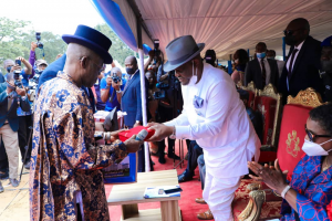 Governor of Rivers State, Nyesom Ezenwo Wike (right) receiving a gift from the Chairman, Governing Council of University of Port Harcourt, Senator Andrew Uchendu during the foundation laying ceremony of a 9,200 capacity convocation arena of the University of Port Harcourt on Tuesday.