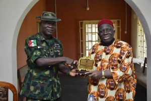 President-General of the apex Igbo socio-cultural organisation, Prof. George Obiozor, presents a plaque to the General Officer Commanding (GOC), 82 Division, Maj.-Gen. Taoreed Lagbaja, visited him in his office in Enugu on Wednesday