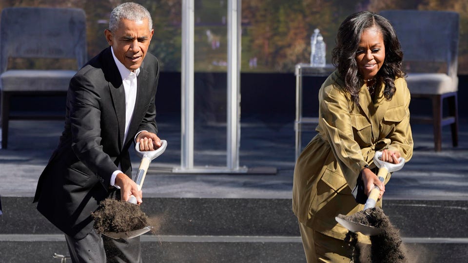 Obama and wife during the ground breaking ceremony. AP