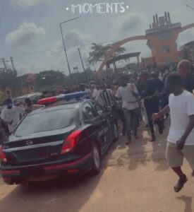 UNIBEN Students turning away a security vehicle at the gate of the university on Wednesday