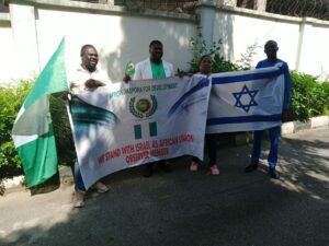 Ambassador Olubunmi Fagbuyiro( (centre) and some members of Africa Diaspora Development during a peaceful rally in Abuja in support of granting observer status to Israel in the African Union.