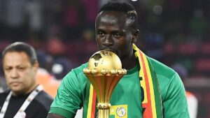 Sadio Mane with the AFCON 2021 Cup