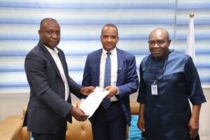 Director General, Nigerian Maritime Administration and Safety Agency (NIMASA), Dr. Bashir Jamoh (middle) receiving his nomination letter as the Vanguard Public Sector Icon, Maritime 2021 from Vanguard Editor, Eze Anaba (right) and Vanguard Saturday Editor, Onochie Anibeze during a visit by the Vanguard Editorial team to the NIMASA headquarters.