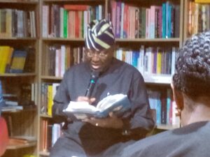 Dr Yemi Ogunbiyi reading an excerpt from his memoirs