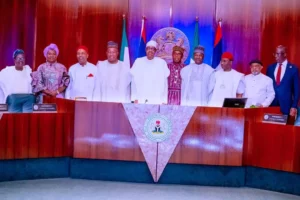 President Muhammadu Buhari and the outgoing members of the Federal Executive Council (FEC),