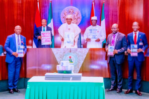 President Buhari unveils new redesigned naira notes