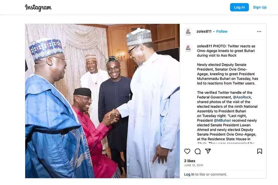 Former Deputy President of the Senate of Nigeria kneeling to greet former President Muhammad Buhari Screenshot from Instagram