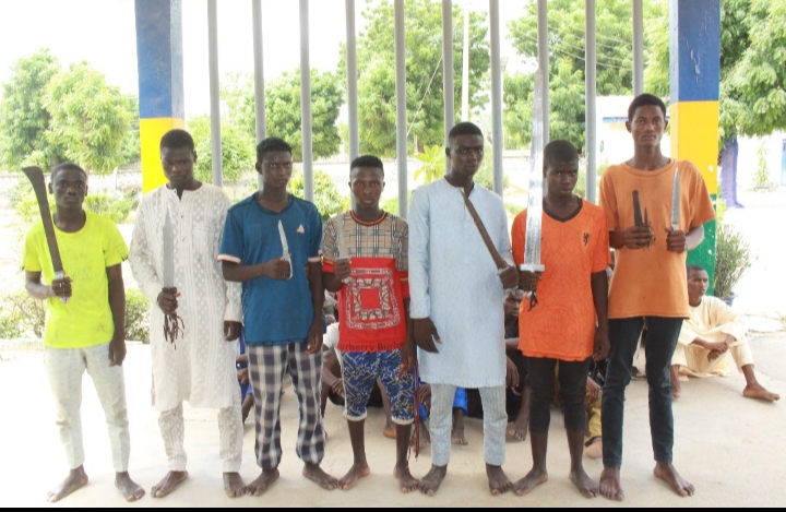 Some of the arrested thugs with their weapons