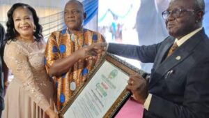 Wife of Chairman, Innoson Vehicles Manufacturing Limited, Mrs Ebele Chukwuma (left); Chairman, Innocent Chukwuma and Director, South East, Standards Organisation of Nigeria (SON), Fred Akingbesote during the 13th-anniversary celebration of the company and presentation of ISO 9001:2015 by SON in Nnewi, Anambra State.