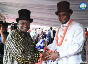 The NDDC Executive Director Projects designate, Chief Victor Antai,(left) congratulating the NDDC Managing Director, Chief Samuel Ogbuku during a reception by Yiba-Ama (Oruma) Community at Yiba-Ama School Field in Ogbia Local Government Area of Bayelsa State.