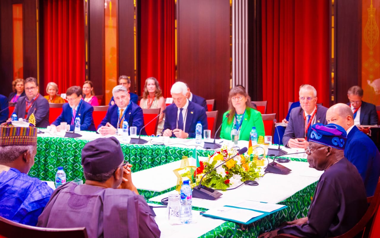Tinubu, right at a meeting with German Chancellor Olaf Scholz who was on a State Visit to Nigeria with a delegation of top business men and women from Germany